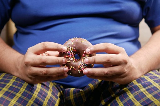 Come l’obesità può causare problemi in camera da letto