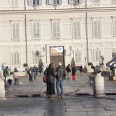 turisti davanti a Palazzo Reale